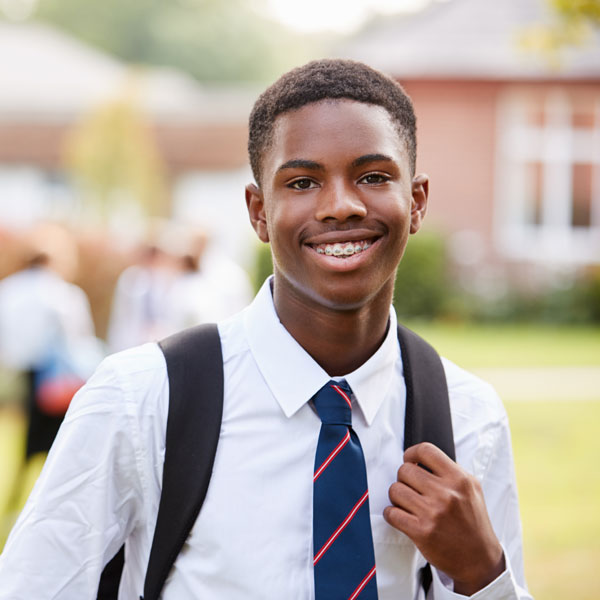 Male school student studying abroad